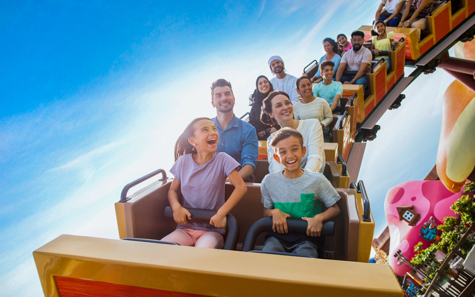 Family enjoying roller coaster ride at Motiongate Dubai